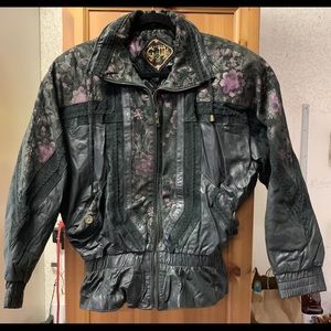 Black leather jacket with floral details